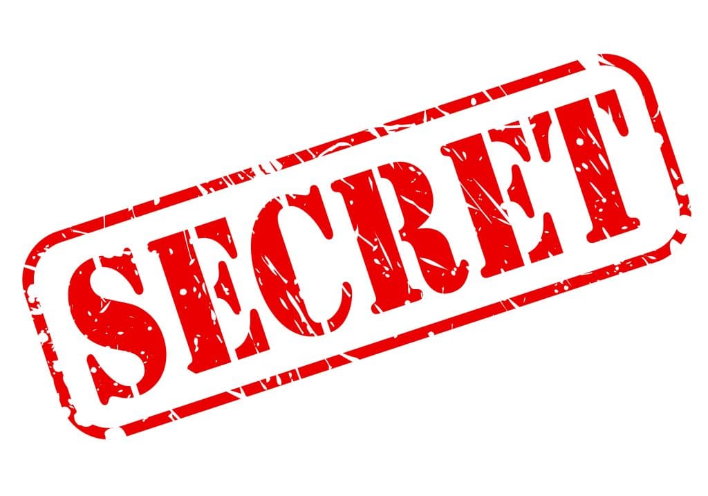 The word secret in red stamp text. 